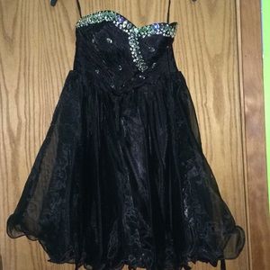 Black strapless dress with. Corset back